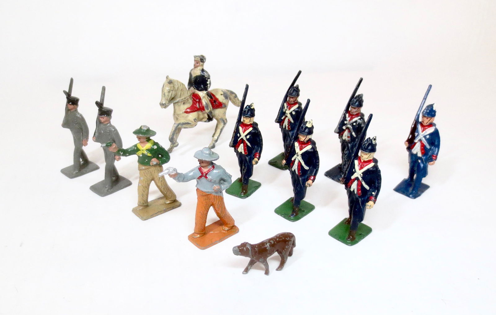 Lincoln Logs Toy Soldier Assortment: Cowboys, West Point Cadets, Infantry of 1812, Dog, and George Washington. 12 pieces. Excellent to very good condition. Unboxed.