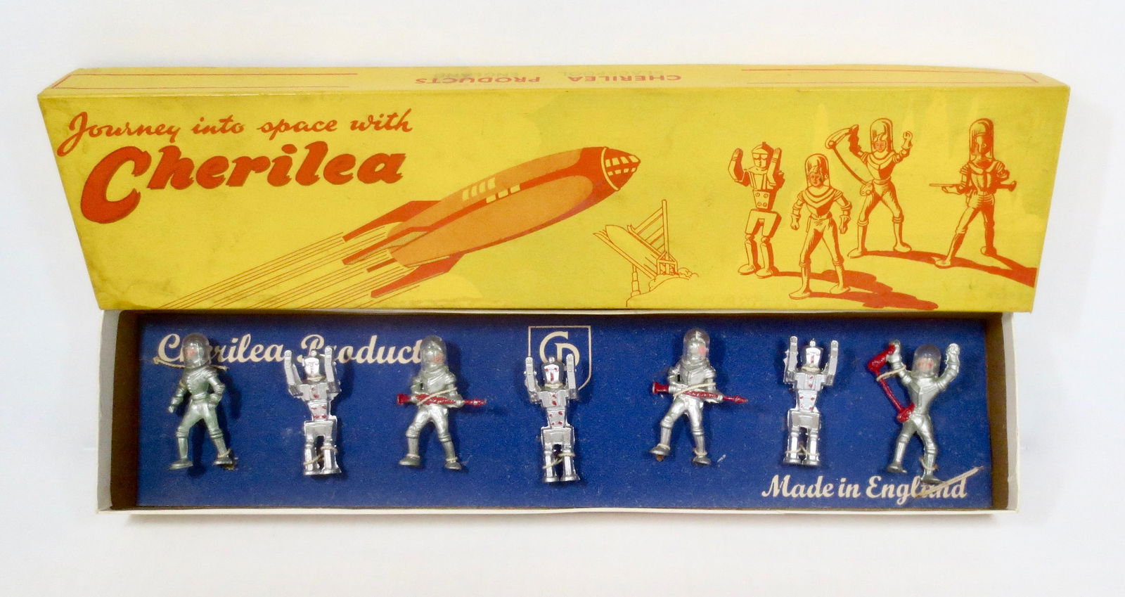 Cherilea RARE #1001 Spacemen Boxed Set: "Journey Into Space" set with four spacemen in removable plastic helmets and three robots. 7 pieces. MINT condition, tied to original card in illustrated box. Box excellent.