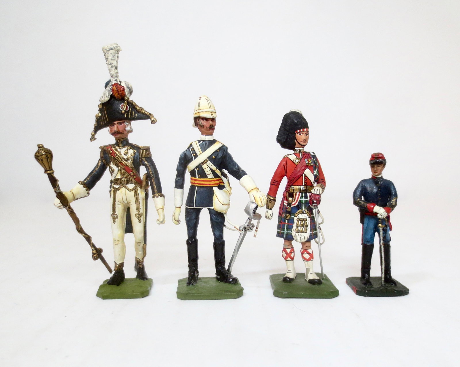 Greenwood & Ball Medley of Soldiers: Superb sampling of Regiments and sizes. 45mm-54mm. Confederate Artillery, Seaforth Highlanders, Trooper of the 17th Lancers 1879, and Drum Major of the Imperial Guard 1802. Mint condition.