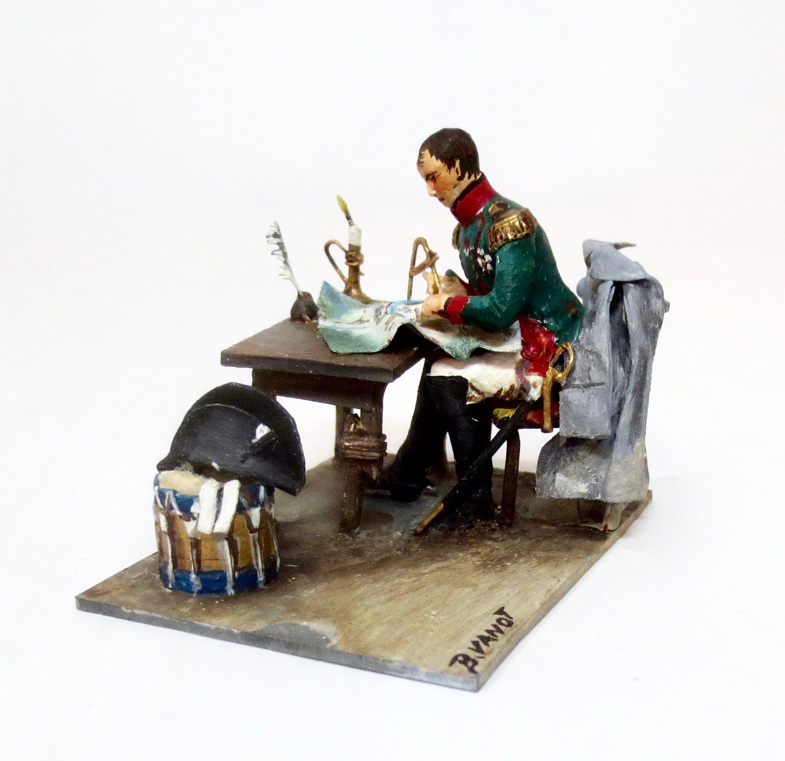 Bernard Vanot "Napoleon at his Desk" Vignette: Fine details make this lot a stand out in this auction! Napoleon carefully studies a map as he prepares for battle. His hat rests on a drum, coat on chair back, feathered pen in inkwell, and a flicker