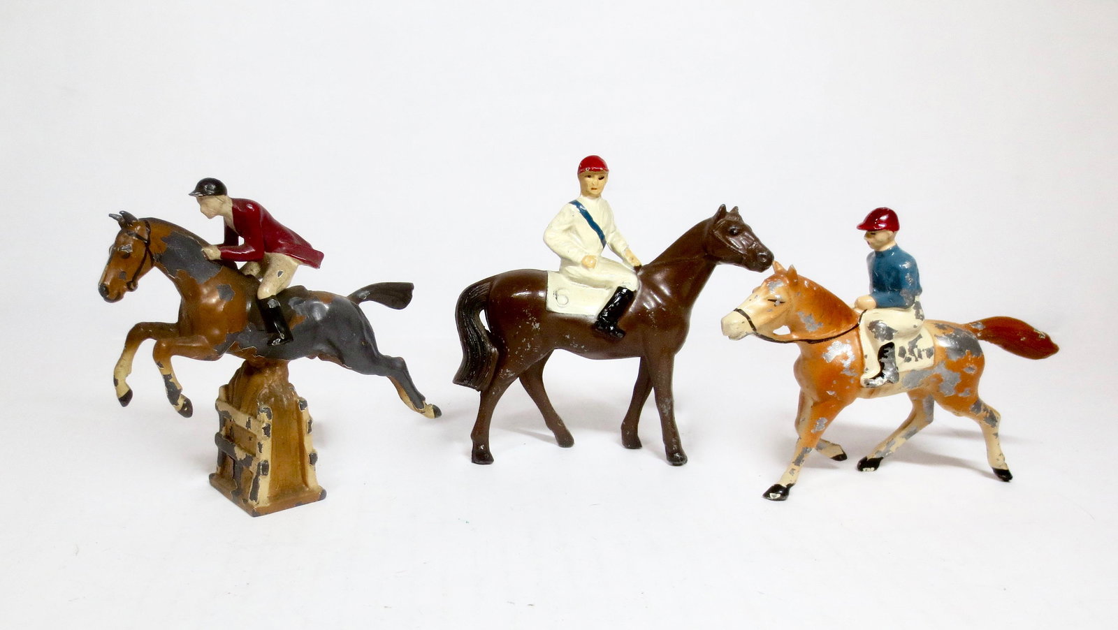Race Horse Assortment: Variety of figures from different makers. 3-1/2" to 4" tall. 3 pieces. Unidentified makers. Excellent to good condition, with some paint loss.