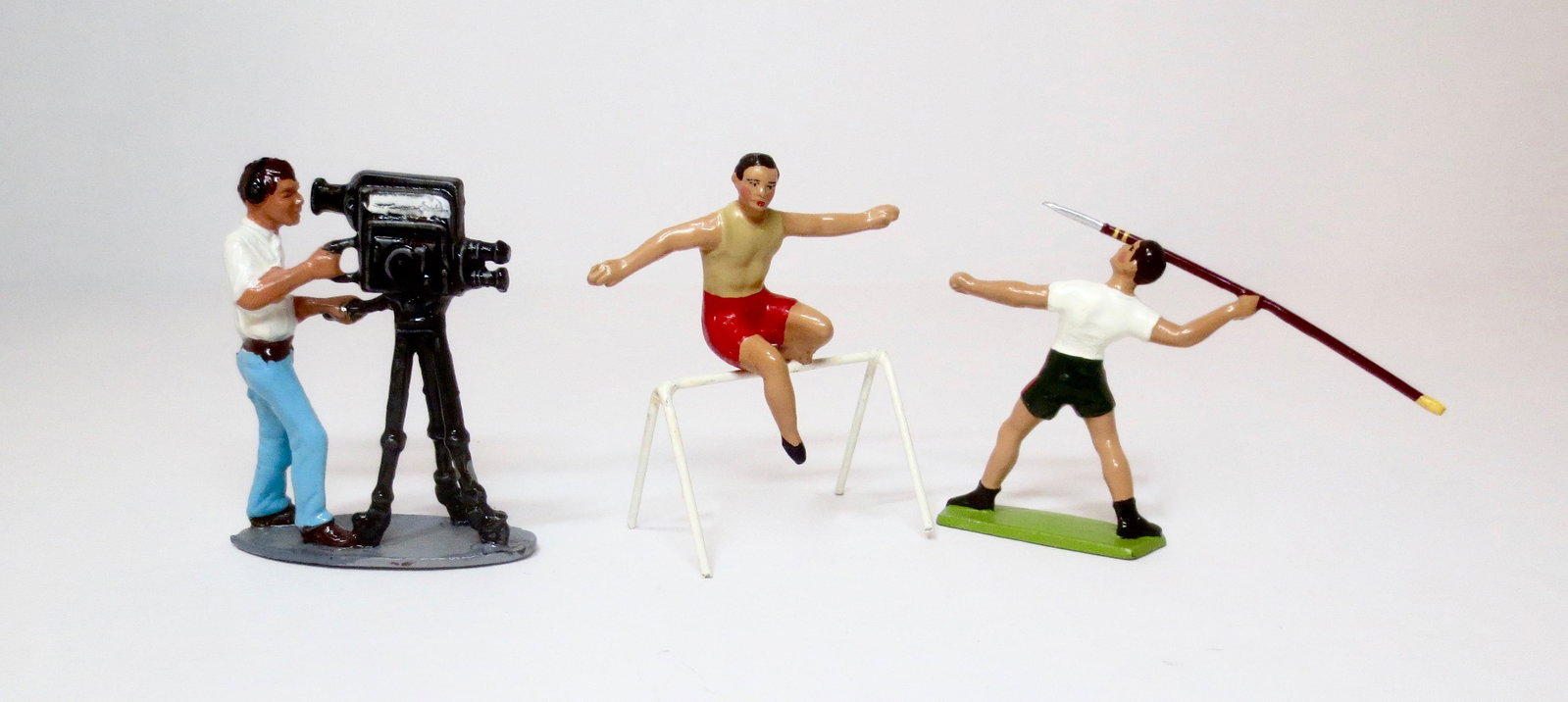 C.B.G. Mignot Olympic Sports Assortment: Hurdler, Javelin Thrower, and TV Camera Man. 3 pieces. Excellent condition. Unboxed.