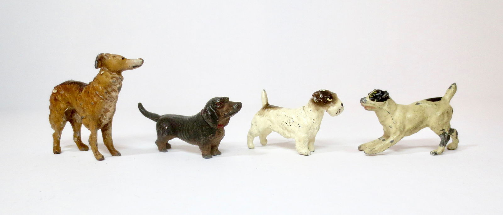 Heyde Assorted Dogs: 35mm to 50mm tall. 4 pieces. Excellent condition.