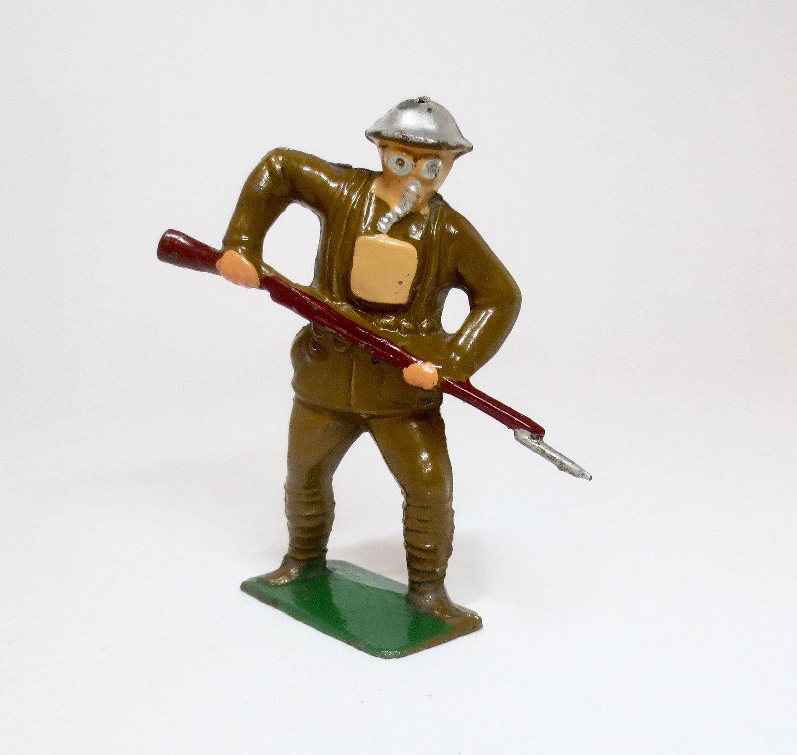 Jones American Infantry of 1920: In Gas Mask, stabbing with bayonet. From the "Metal Arts Miniatures" Line. 3" tall. Near mint condition. Unboxed.