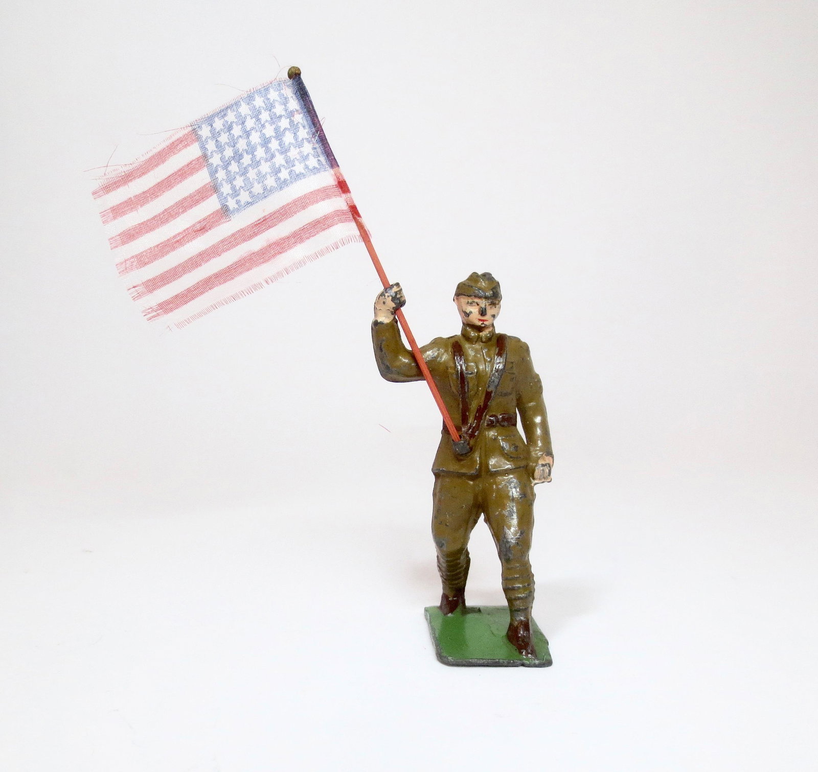 Jones American Infantry of 1920 with Flag: From the "Metal Arts Miniatures" Line. 3" tall. Very good condition (some paint loss). Unboxed.