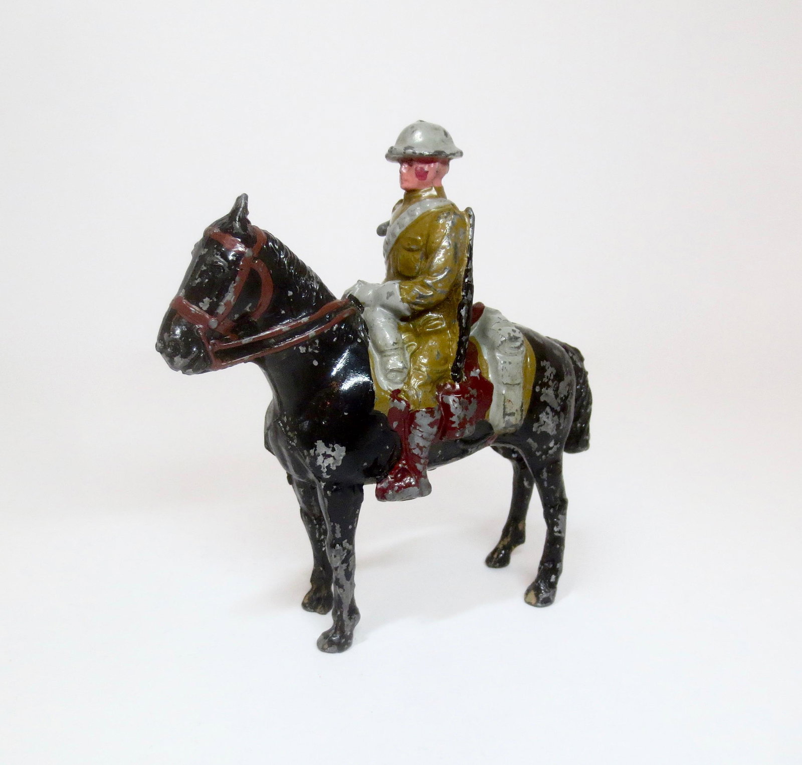 Jones RARE American 2nd Cavalry of 1918: From the "Metal Arts Miniatures" Line. 4-1/2" tall. Very good condition (missing right arm, comes with casting that may possibly be used as a replacement). Unboxed.