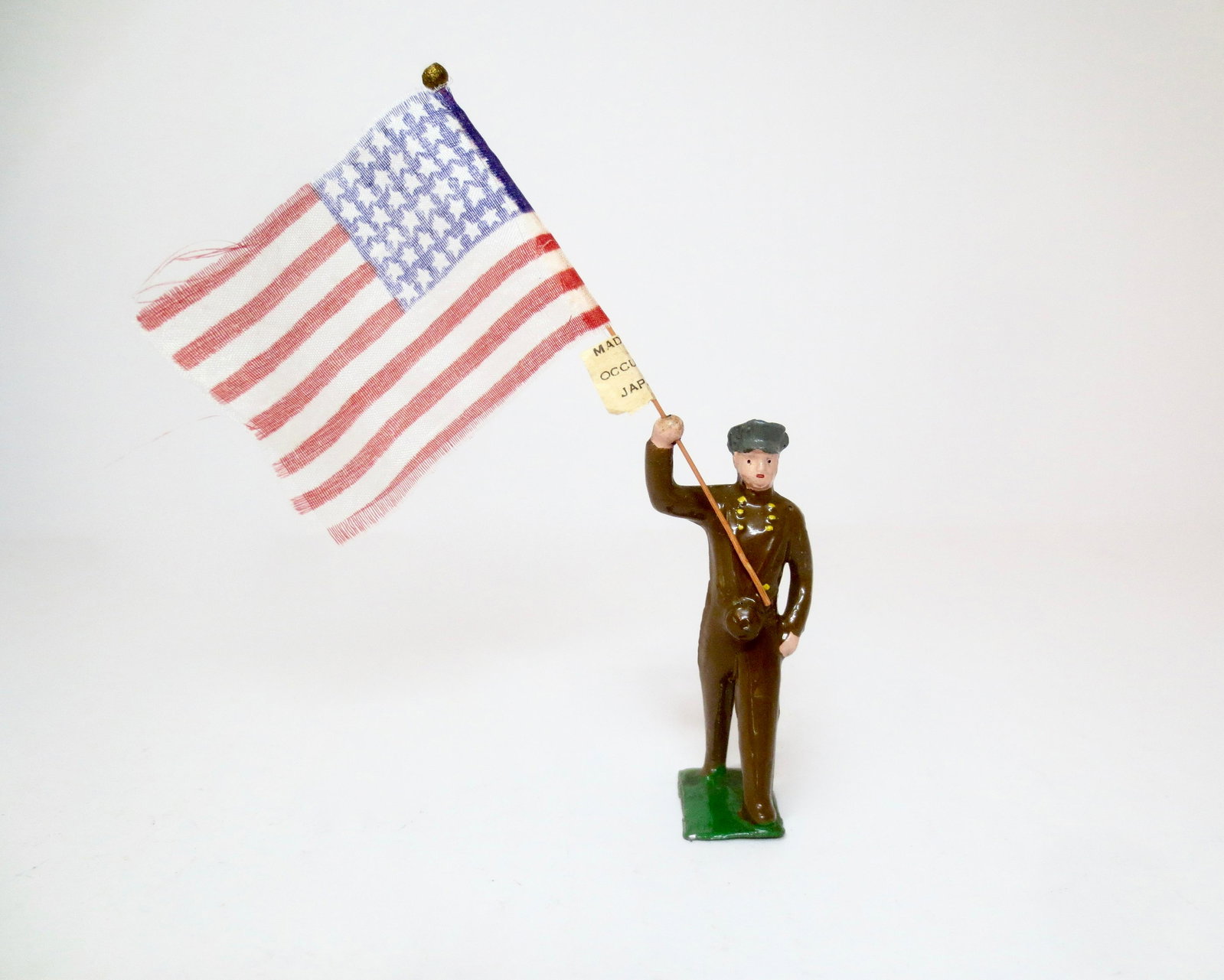 U.S. Army with Flag of 1941: Rare figure with flag made in Occupied Japan. Excellent condition. Unboxed.