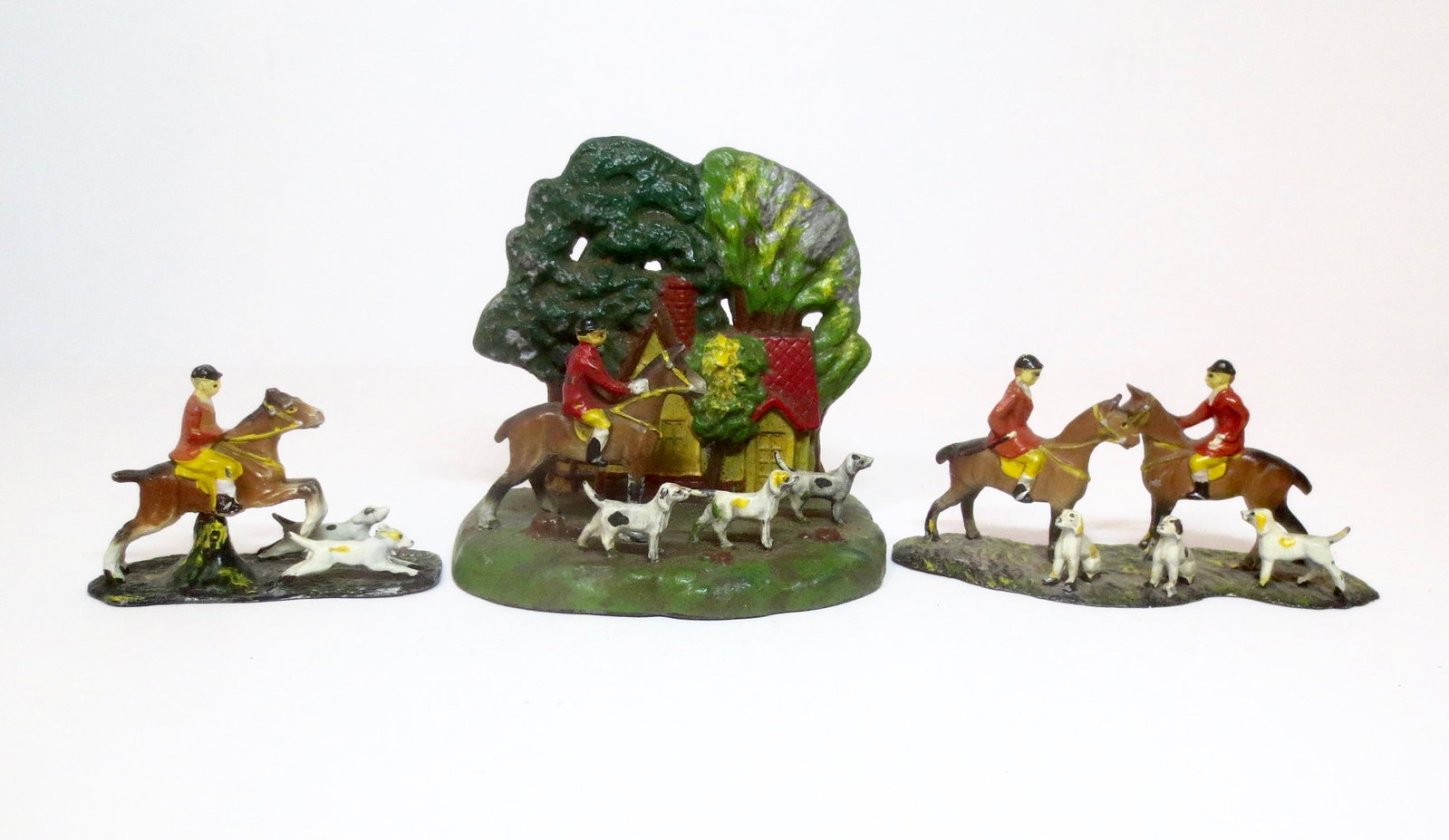 Vintage Hunt Vignettes: Japanese maker. 2-1/2" to 4-3/4" tall. 3 pieces. Excellent to good condition (one figure in the center vignette has been reattached, but there is a hole in the base). Unboxed.
