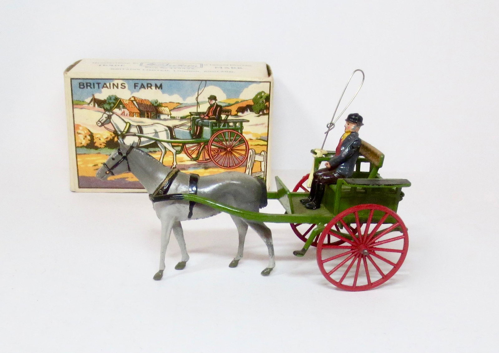 Britains #20F Farmer's Gig: Post war issue. 4 pieces. Near mint condition. Box excellent.