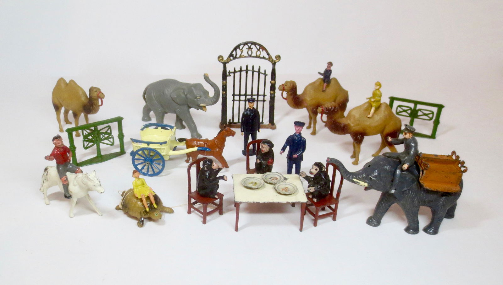 British Hollowcast Zoo Assortment: Rare Taylor Barrett Chimpanzee Tea Party, Charbens Zoo Keeper on Elephant, Crescent Pony Ride and more. 30 pieces. Excellent to very good condition (Charbens Zoo Keeper missing riding crop). Unboxed.