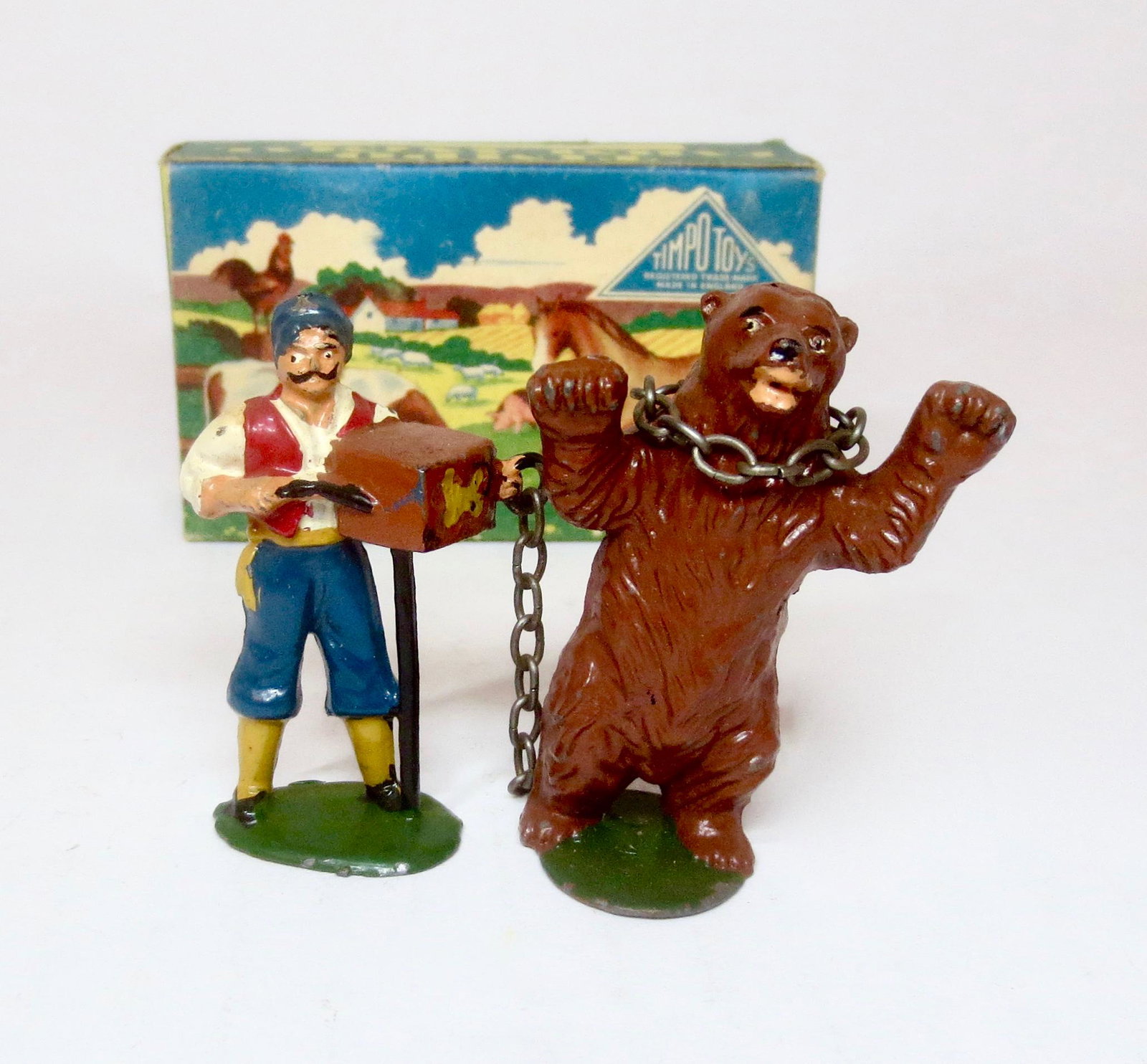 Timpo RARE Gypsy with Dancing Bear: Hard to find and complete with chain leash & original box. 2 pieces. Excellent condition. Box excellent.
