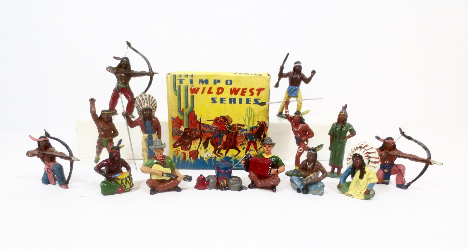 Timpo Cowboys and Indians: Cowboy Campfire Musicians boxed set, surrounded by a wide variety of Indians on Foot. 14 pieces. Excellent condition. Box excellent.