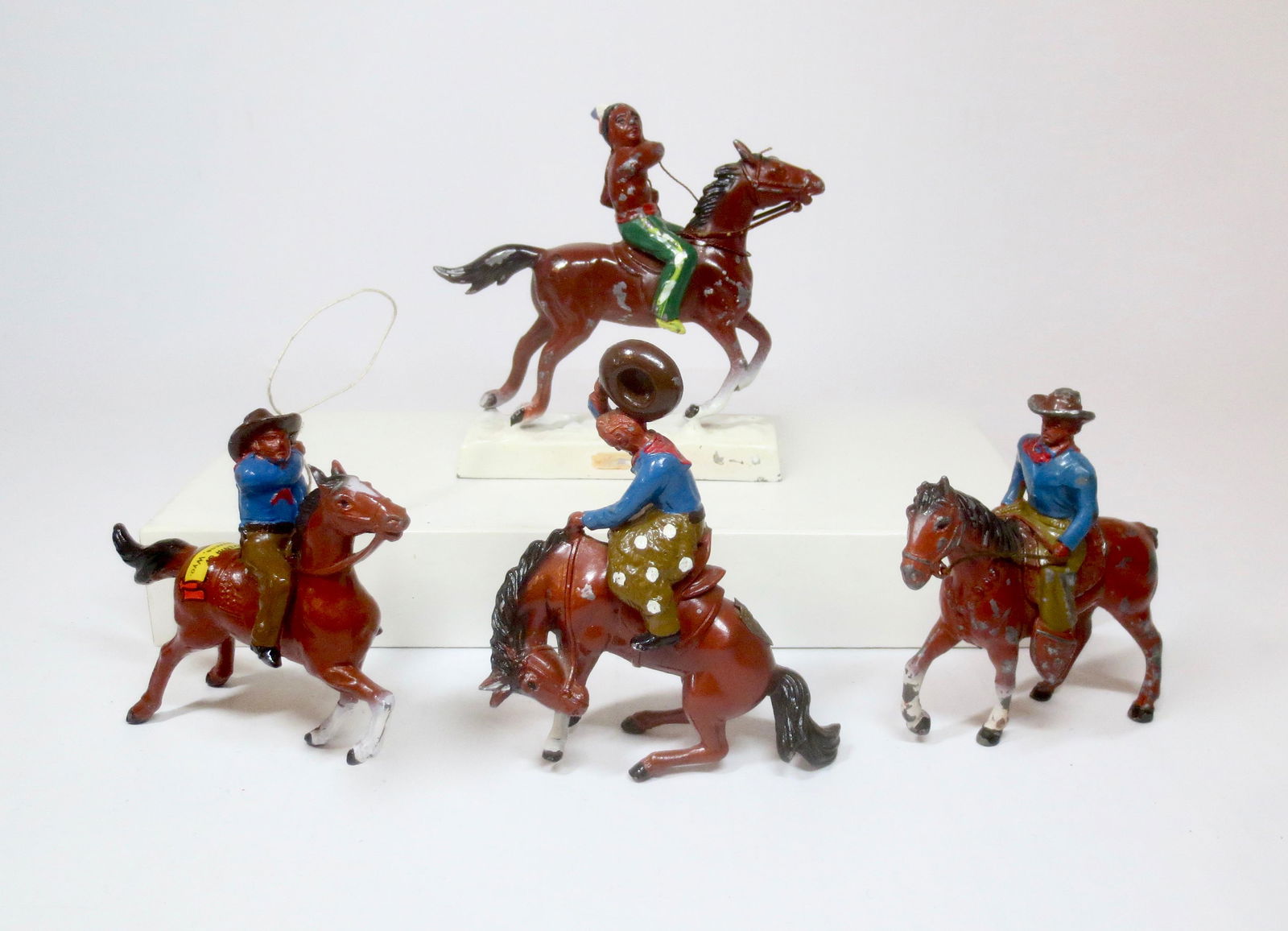 Vintage Wild West Souvenirs: Nice selection. Measuring 3" to 4-1/2" tall. One from Cheyenne, Wyoming and the rest unmarked. 4 pieces. Excellent condition (one horse missing tail). Unboxed.