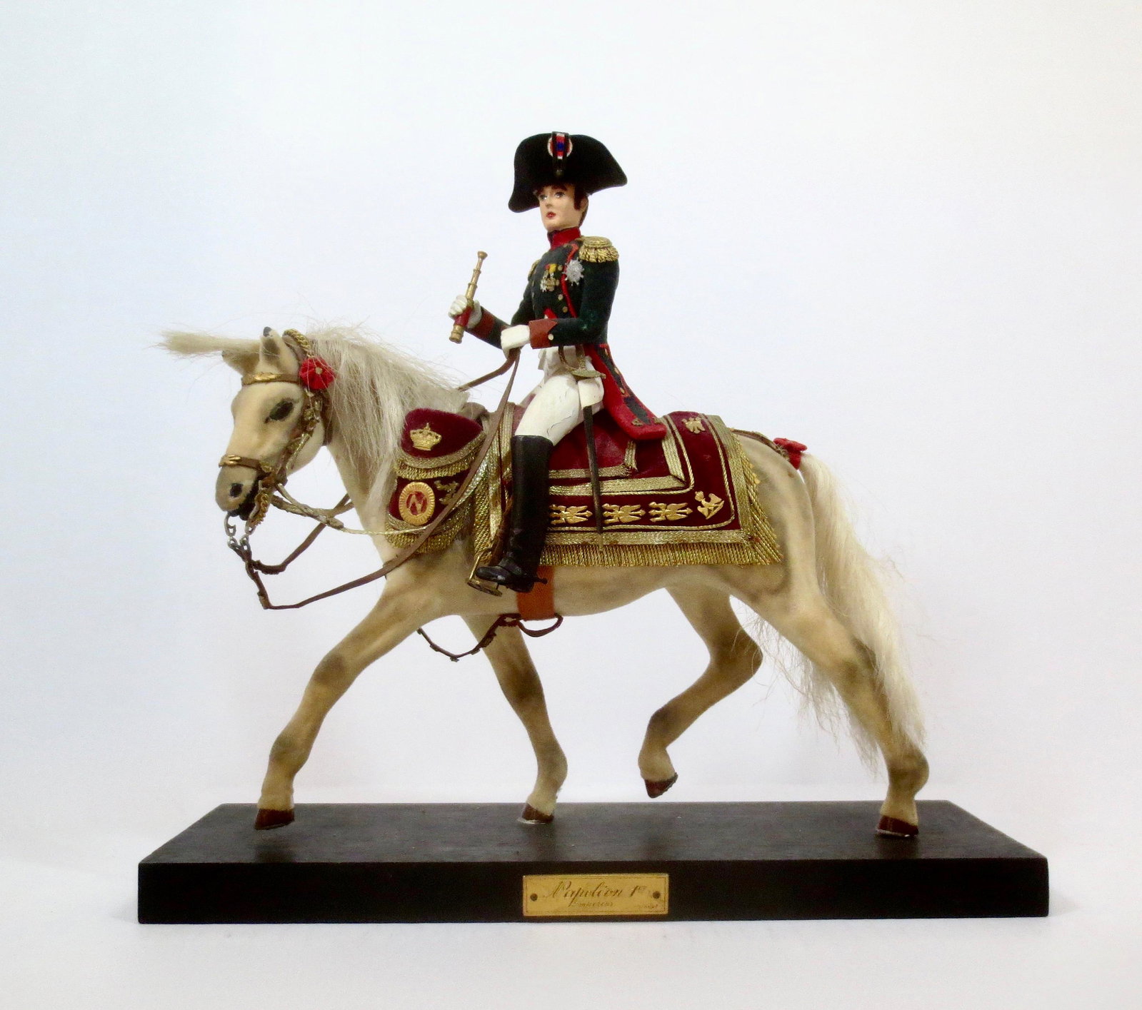 RARE Marcel Riffet "Napoleon 1st": Magnificent figure by Marcel Riffet. Well known artist for using actual material to dress his models. Signed on the bottom. 11" tall including the base. Flocked Plaster horse. Figure is hand decorated