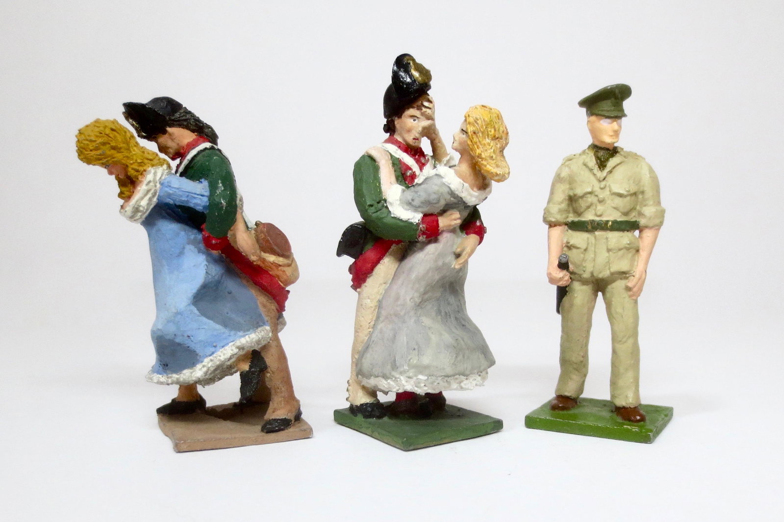 Jane Jackson (Canada) Assorted Figures: Scarce figures, circa 1965-1970. Jackson is considered to be the first solid figure model maker in Canada. Includes two soldiers capturing women villagers, and one British Officer (partially painted).