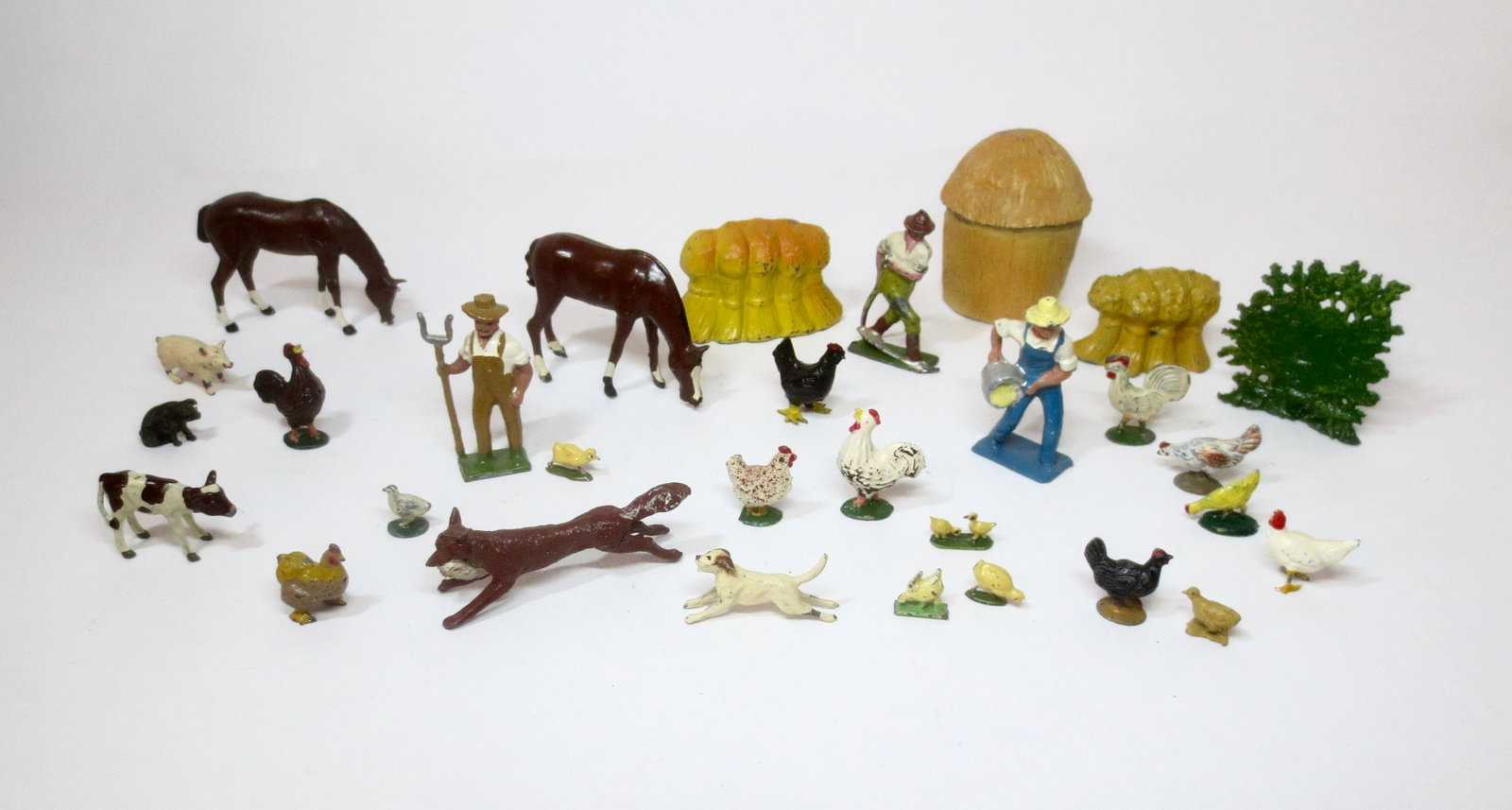 British Makers Farm Assortment: Farmers, Horses, Chickens, and a Rare Johillco Fox running with a stolen goose. 32 pieces. Excellent condition. Unboxed.