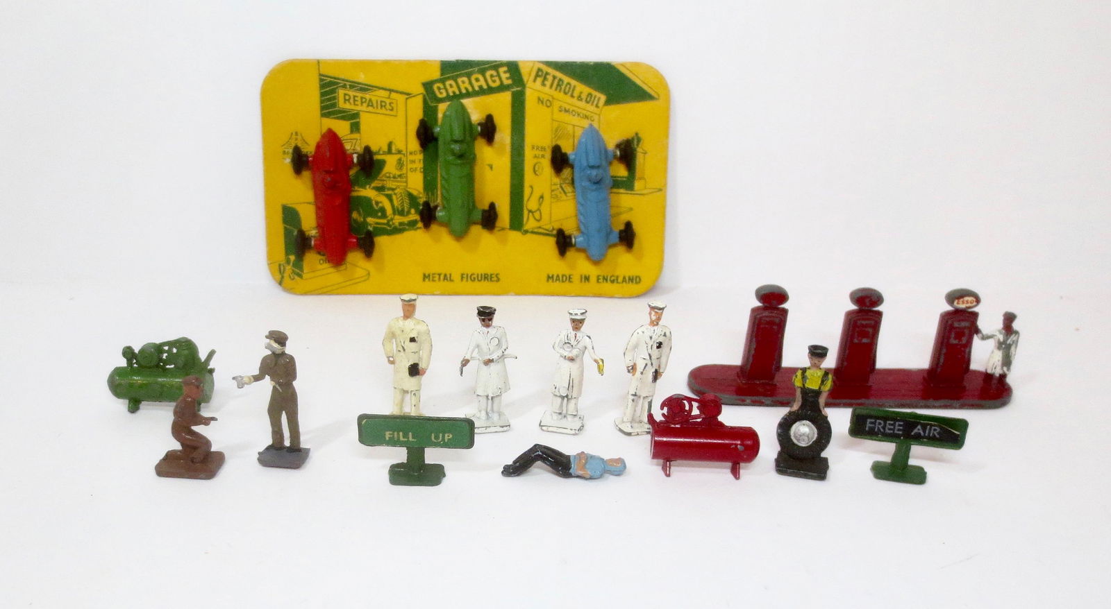 British Makers Miniature Garage Collection: Assorted 25mm to 40mm figures and accessories from Crescent, Wardie, and Lesney in excellent to very good unboxed condition. Plus three Race Cars in Mint condition, still tied to the original card.