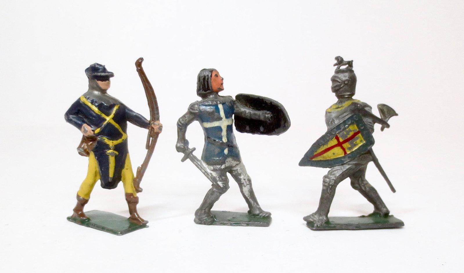 Courtenay Doran Medieval Figures: English Bowman, Knight with sword, and Knight with Axe. 3 pieces. Very good condition. Unboxed.