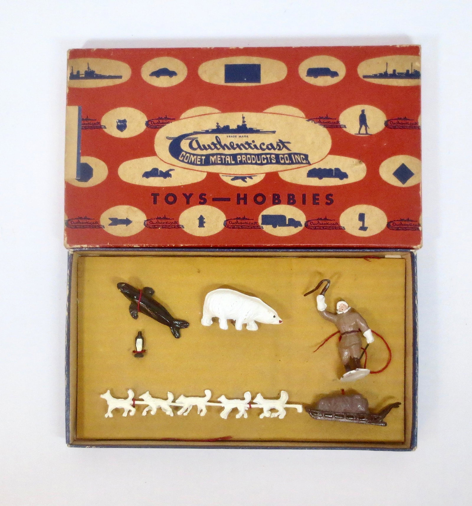 Authenticast RARE Arctic Sled Set: Explorer with Sled Team, Polar Bear, Walrus, and Penguin. Near mint to excellent condition, with some figures still tied in the box. Box good (top splits on all four corners).