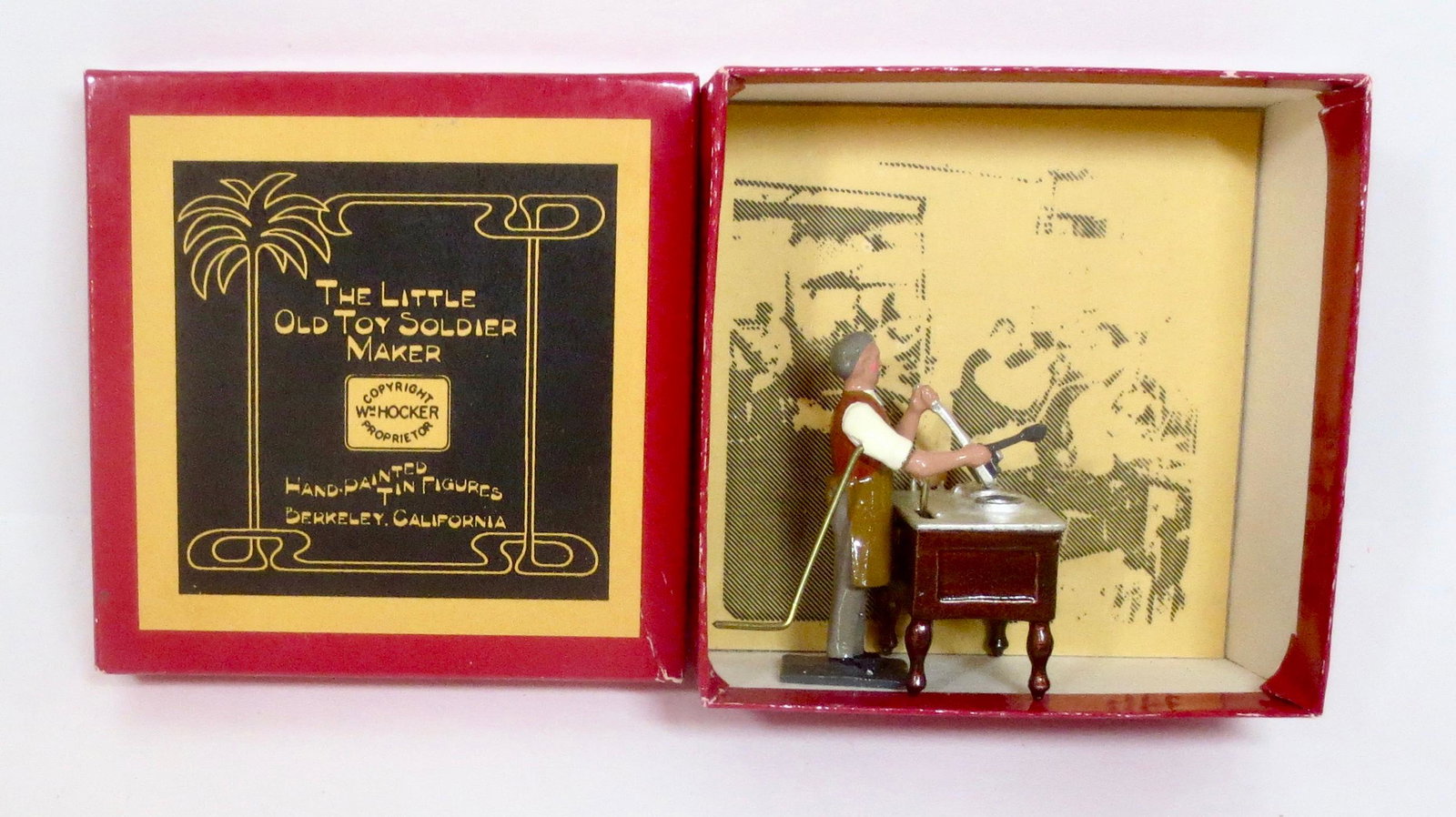 Hocker "The Little Old Toy Soldier Maker": Wonderful tribute to the casting art. Mechanical figure moves his arm as he pours a mold. Mint condition. Box excellent.