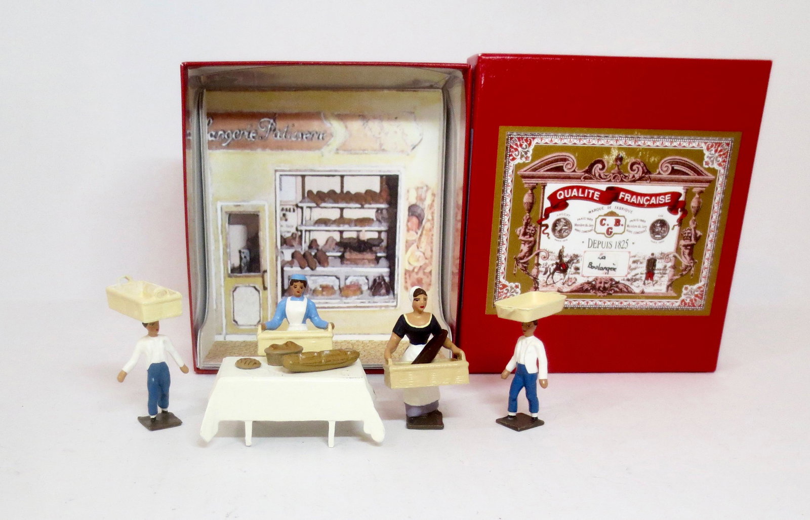 Mignot #9020 "Boulangerie" Diorama: Bakery women and children at work. 5 pieces. Near mint condition. Box excellent.
