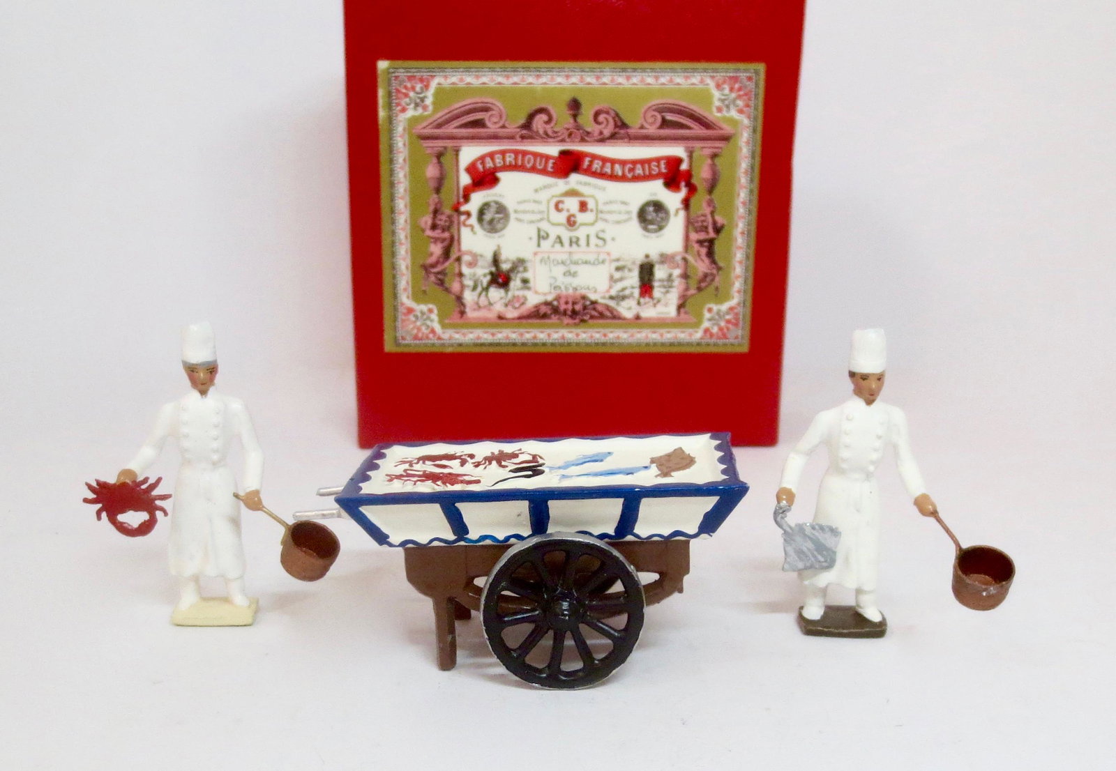 Mignot "Marchaude de Poissons": Chefs with Fish Cart. 3 pieces (plus fish). Mint condition. Box excellent.