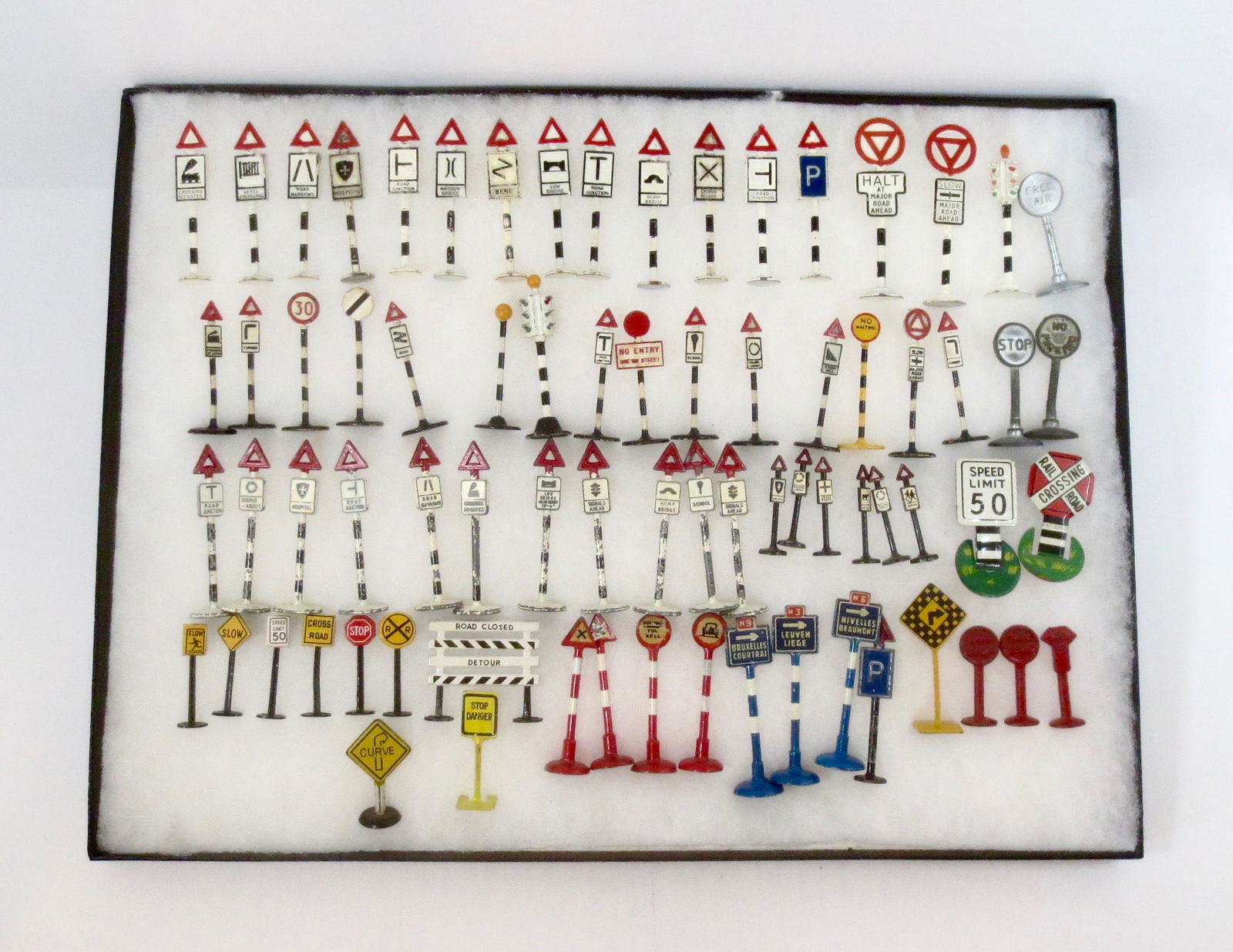Miniature Road Sign Assortment: Variety of makers and signs. 1-1/2" to 2-1/2" tall. 74 pieces. Near mint to excellent condition. Unboxed.