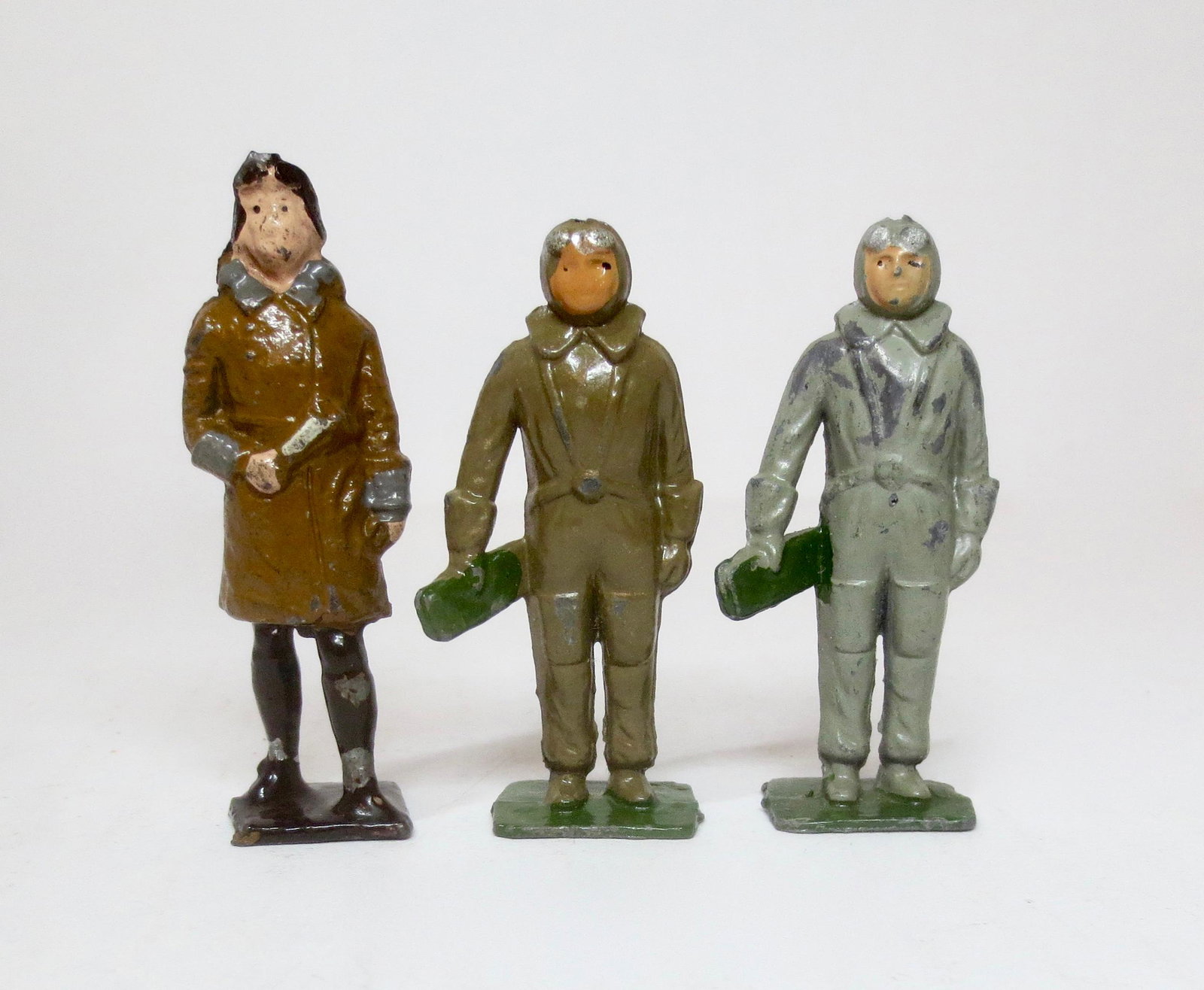 Crescent Airmen: Pre war Pilot in flight jacket, and two post war Pilots with flight orders. 3 pieces. Excellent condition. Unboxed.