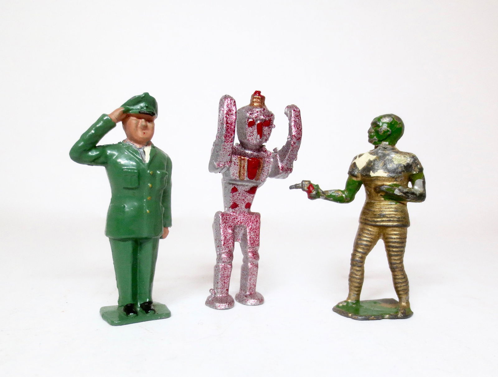 British Space Figures: Digby and Treen from the Dan Dare set, plus a Cherilea Robot. 3 pieces. Excellent to very good condition, with some paint loss. Unboxed.
