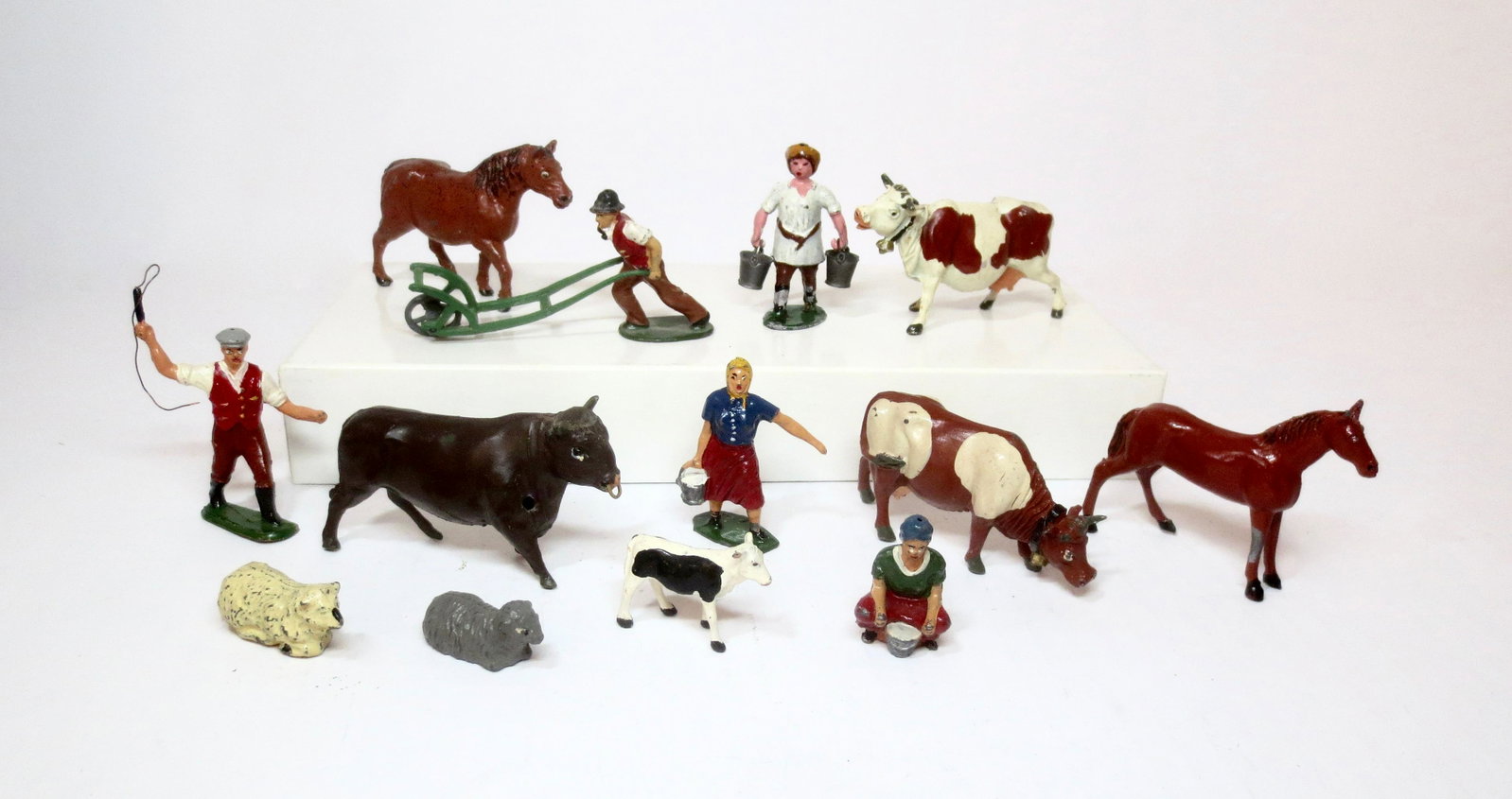 Timpo Farm Assortment: Milkmaids, Farmer, Drover, Horses and more. 14 pieces. Excellent overall condition (Bull has a small hole in his front side). Unboxed.