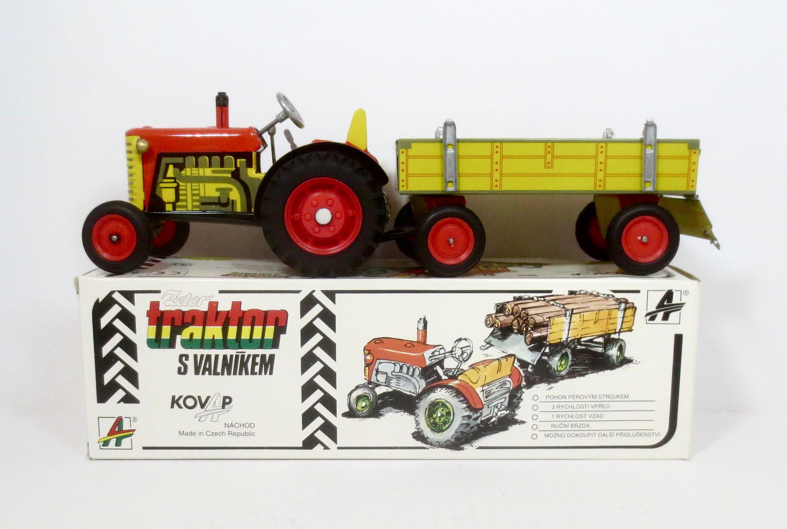 Nachod Tin Wind Up Traktor and Trailer: Made in the Czech Republic. 11-1/2" long. Near mint and working condition. Box good.