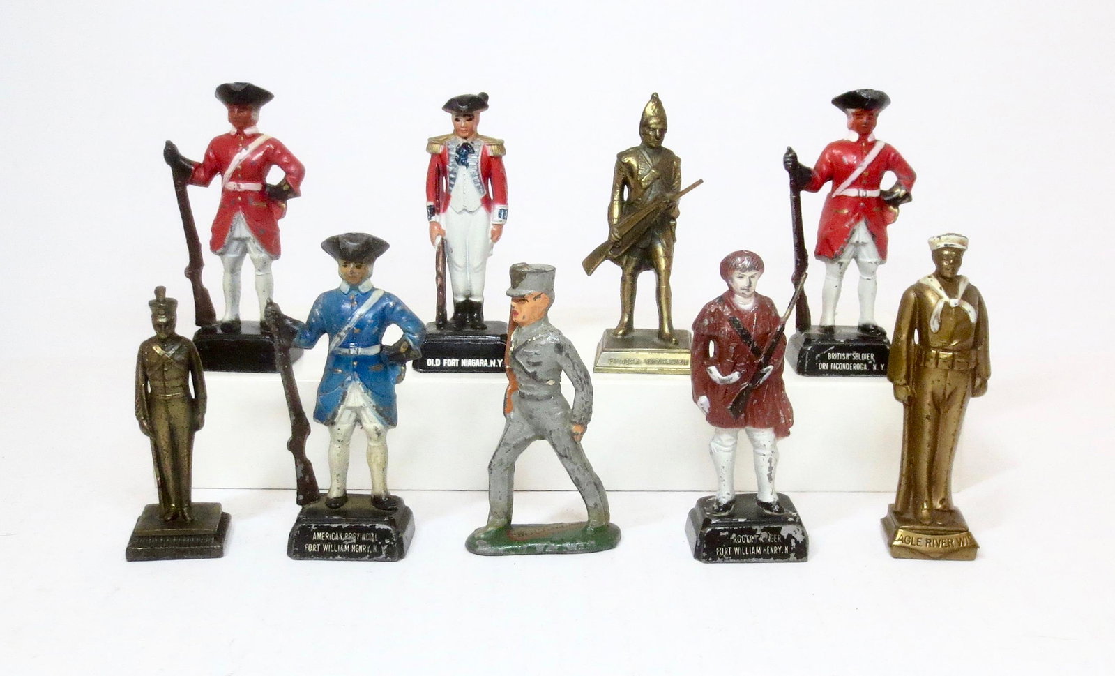 Vintage Soldier Souvenirs: Produced by Wilton, Barclay and similar makers for the American tourist trade. Locations include; Fort William Henry, Fort Ticonderoga, Old Fort Niagara, West Point, and Eagle River (one unmarked). 3"