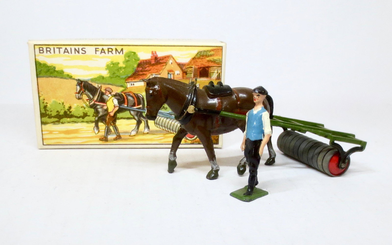 Britains #9F Horse Roller with Man Set: Post war in original Illustrated box. 3 pieces. Near mint condition. Box excellent.