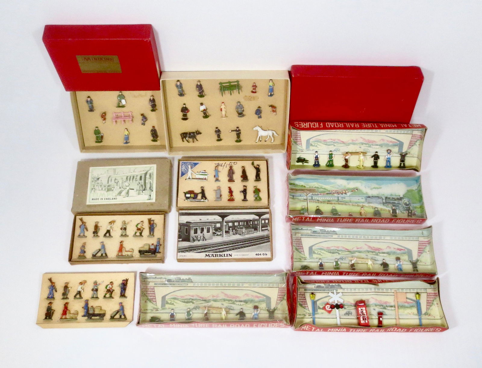 HO Railway Sets: Figures and accessories from Minikins, Timpo, Marklin and others. 95 pieces. 10 sets. Mint condition. Boxes very good to good (2 missing cellophane wrap, 1 set on card without box).