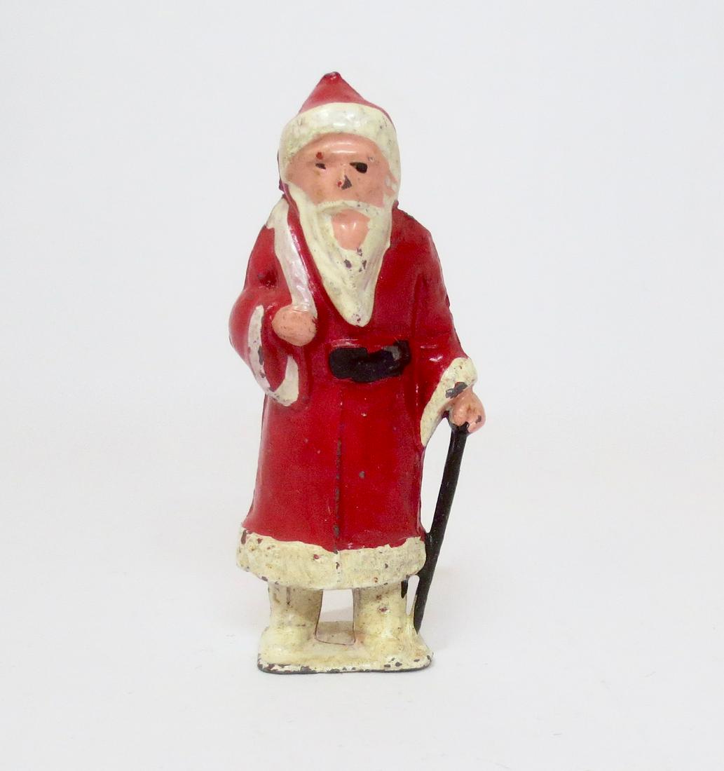 Johillco "Father Christmas": Ho Ho Ho! Post war version, with white boots. Measures about 2-3/4" tall. 1 piece. Excellent condition. Unboxed.