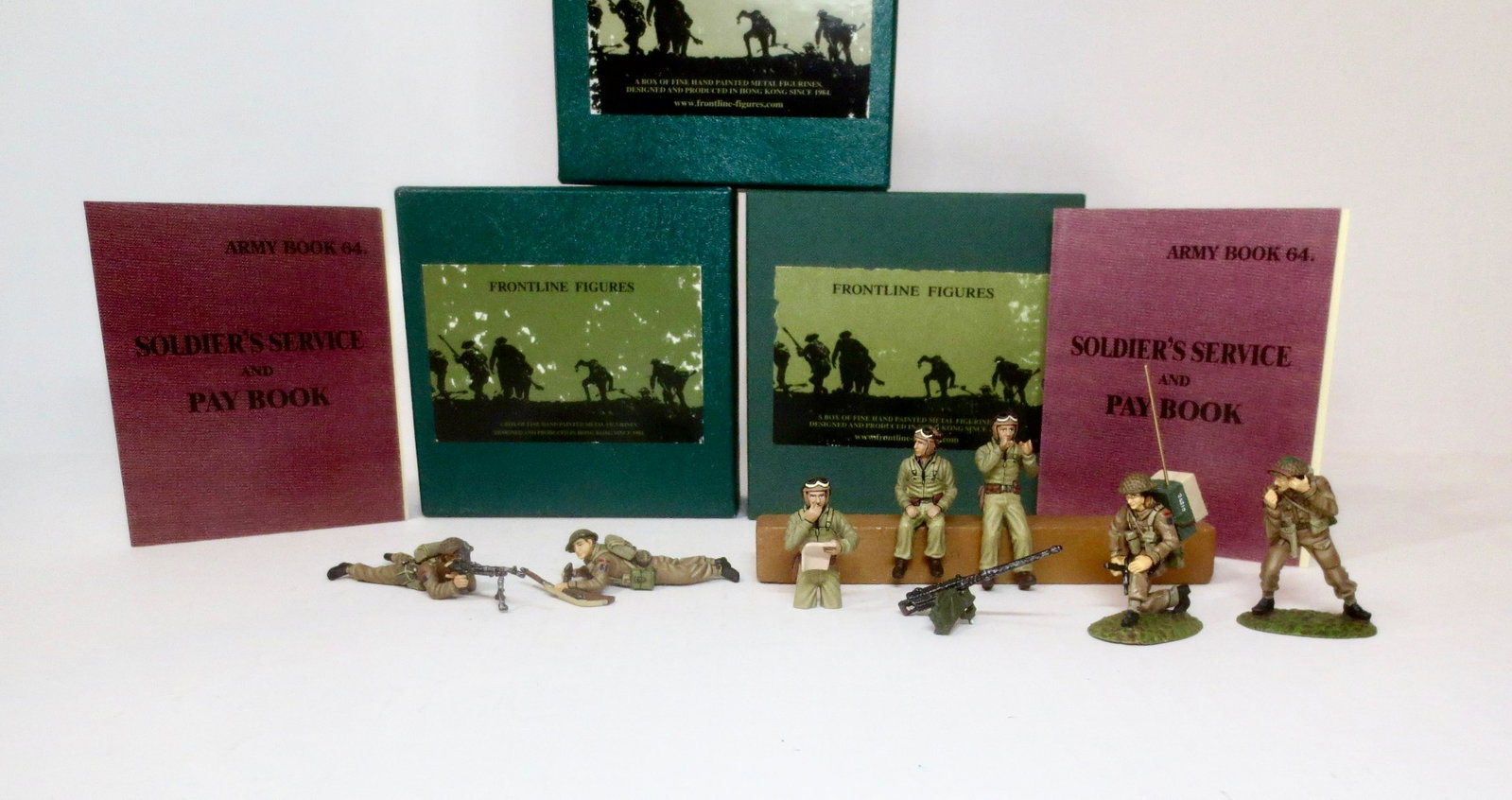 Frontline Figures World War Two Sets: British Infantry Radio Team (#WBI7), Bren Gun Team (#WBI4), and American Sherman Tank Crew (WUSTR1). 8 pieces. Near mint condition. Boxes excellent.