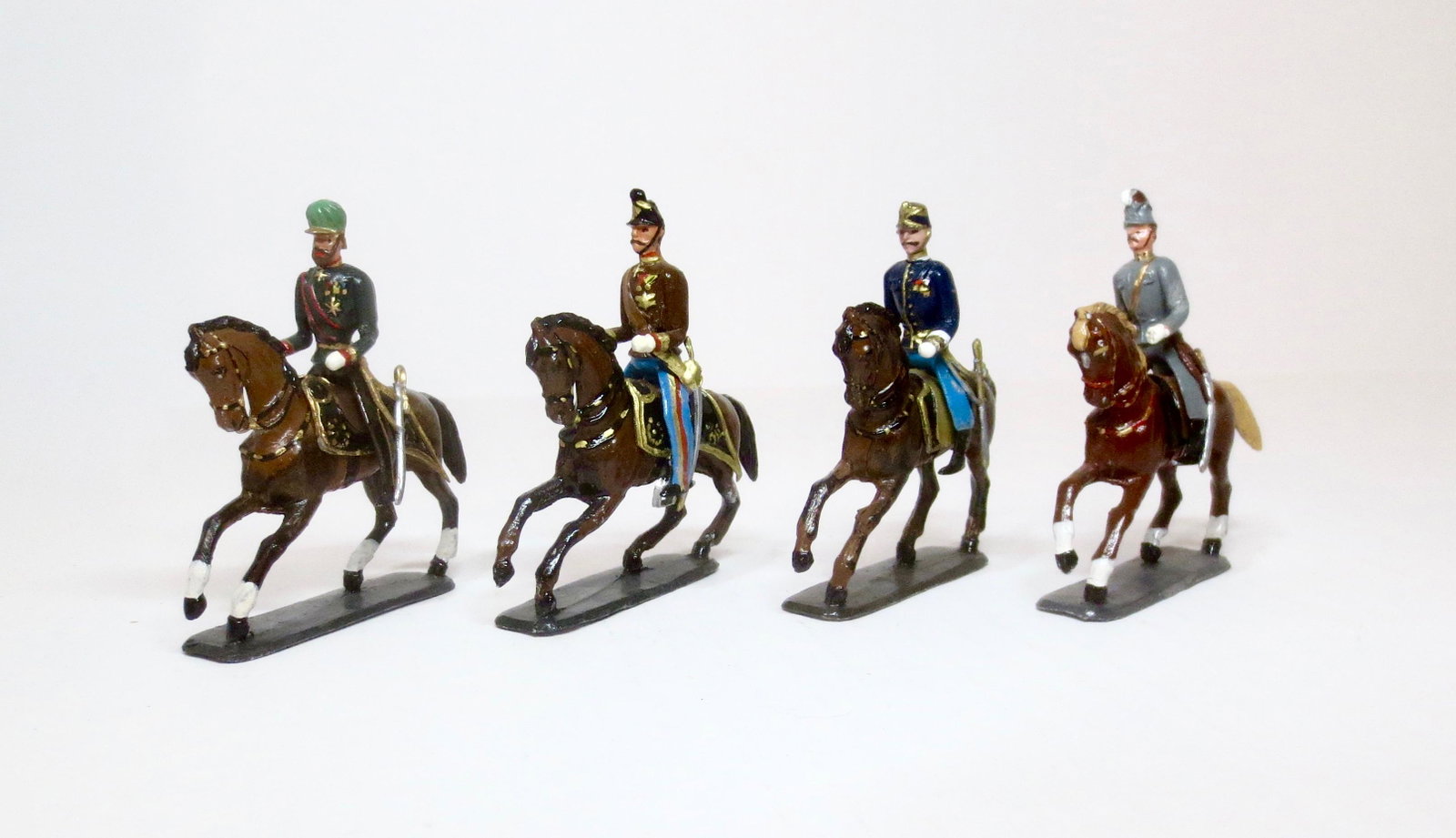Wollner Mounted Figure Selection: Post war issue, circa 1960's. Kaiser, Artillerie Officer, Deutchmeister, and Alpen Jaeger. 4 pieces. Excellent condition. Unboxed.