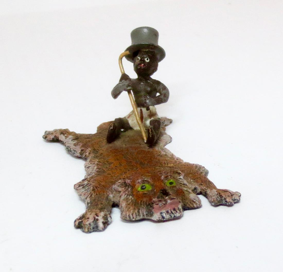 Heyde RARE Black Americana Boy on Tiger Rug: Spectacular vignette. Measures 50mm tall by 60mm long. Excellent condition. Unboxed.