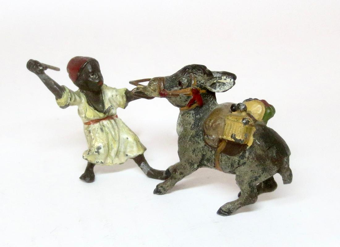 Heyde Arab Boy with Stubborn Donkey: Measures 42mm tall by 90mm long. 1 piece. Excellent condition. Unboxed.