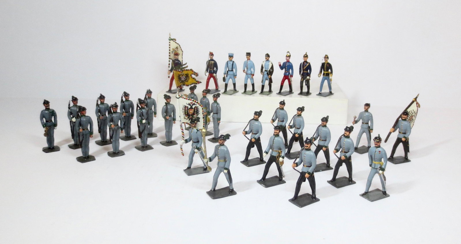 Wollner/Kober Large Infantry Assortment: Post war (Austria) issue. 54mm. Variety of troops including; 12 Austrian Jagers at attention, 12 marching, and 8 Hungarian figures. 32 pieces. Near mint to excellent. Unboxed.