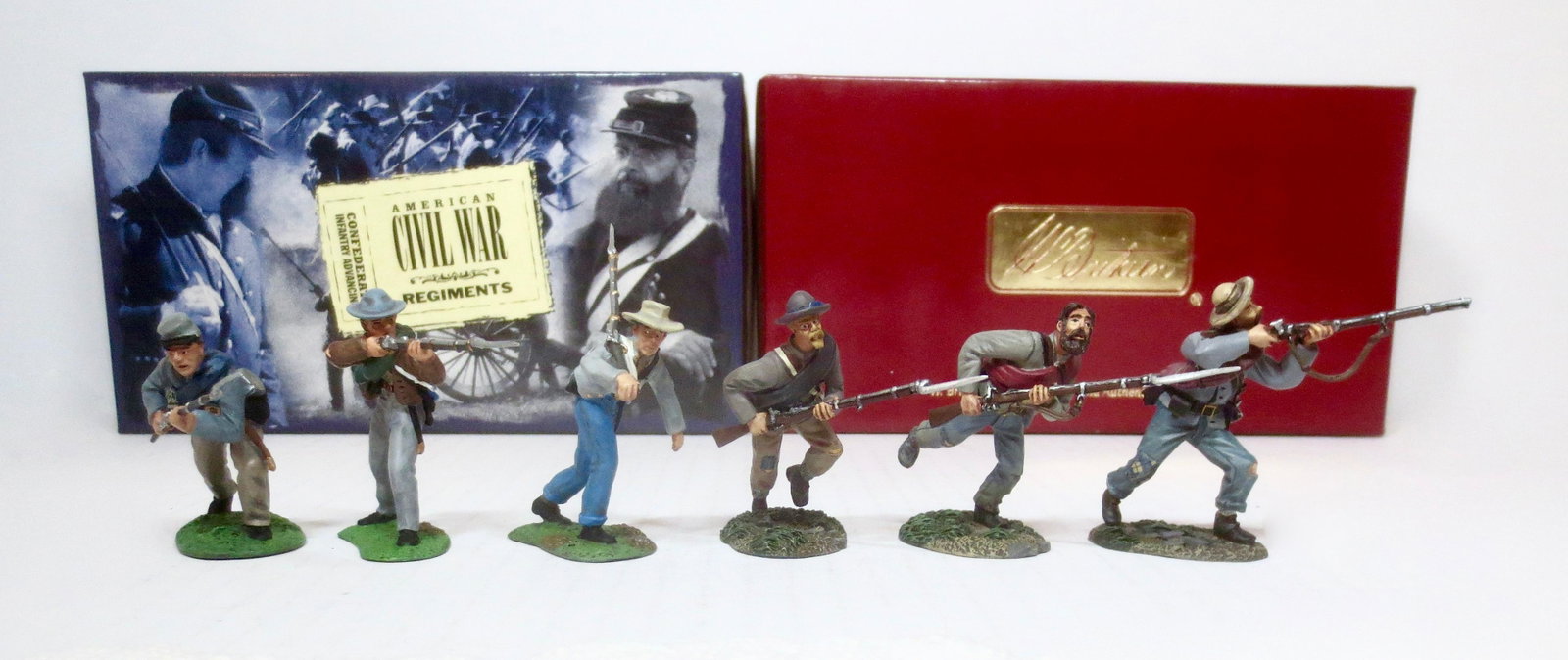 Britains American Civil War Boxed Sets: Confederate Infantry Advancing #17014, and The Stonewall Brigade #17803. 6 pieces. Excellent condition. Boxes excellent.