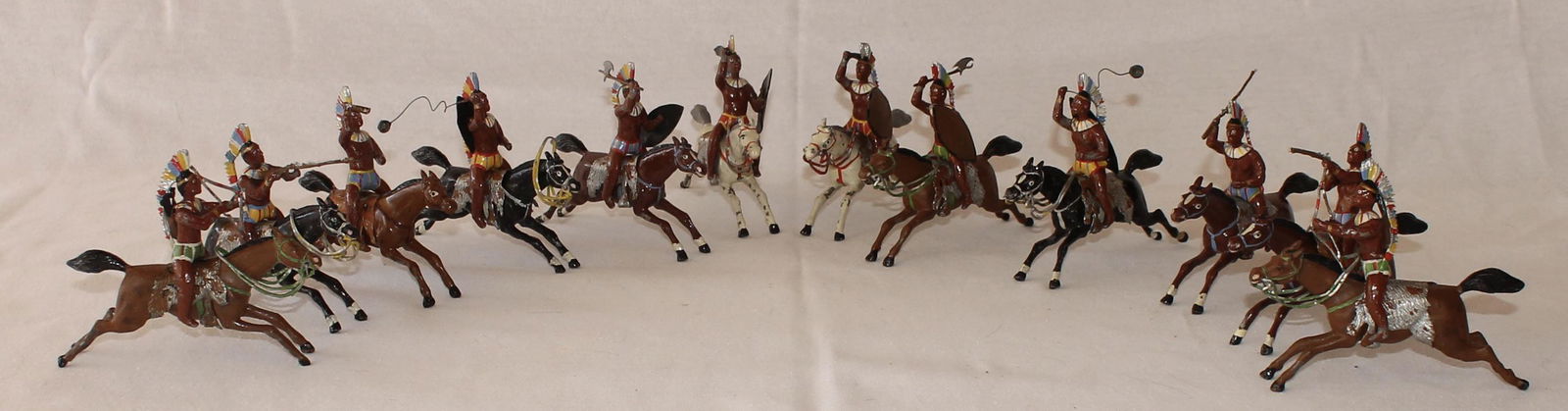 Heyde 70mm American Indians: Heyde of Germany mounted American Indians Set #1122 in large Size 0 (70mm), Circa 1920’s. Set includes 12 horses at the gallop with removeable saddles and 12 riders with various weapons. Figures whe