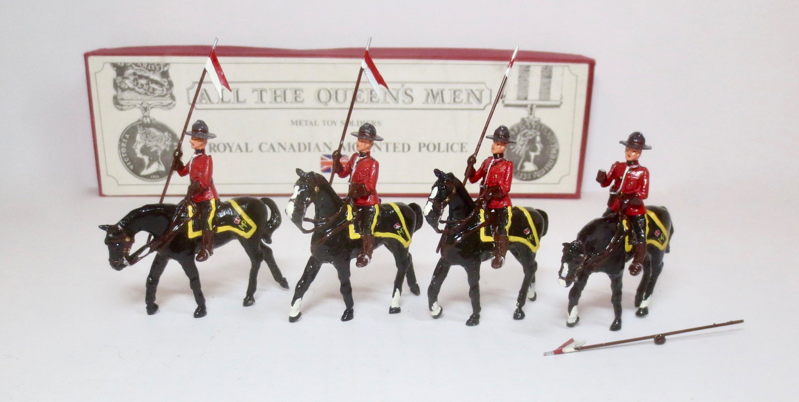 All The Queen's Men RCMP Lancers: 4 pieces. Excellent overall condition (one broken hand with lance, included for repair).