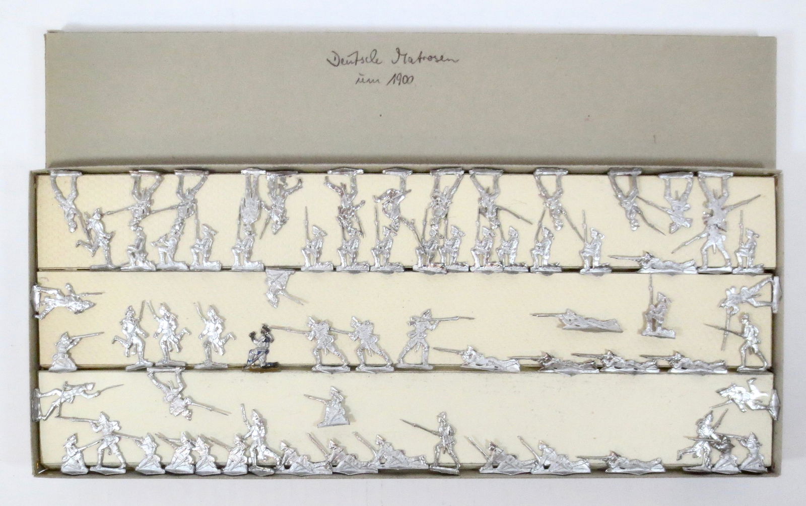 Deutsche Matrosen Circa 1900 Tin Flats: 30mm-35mm. 67pieces. Unpainted castings. Excellent. Comes with box as pictured.