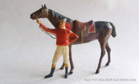 Heyde Jockey Standing holding reins of Horse.: Heyde Jockey Standing holding reins of Horse. 110mm Scale. Pre War German. Circa 1930. 1 Piece. Condition Excellent.