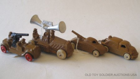 Barclay & Manoil Dimestore Vehicles: Barclay and Manoil Dimestore Vehicles BV7 Armored Car, US Army Motor Unit, BV16 Gun Mounted on Armored Car, BV75a Siren Truck. 4 Pieces. Condition Excellent.