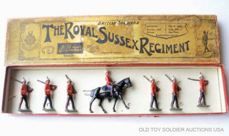 Britains Set # 36 The Royal Sussex Regimen: Britains Set # 36 The Royal Sussex Regiment at the slope with Mounted Officer in original Whisstock Box. Untied. Pre War 1925-1938. 7 Pieces Condition Very Good (Paint chips to chests of two men) Box