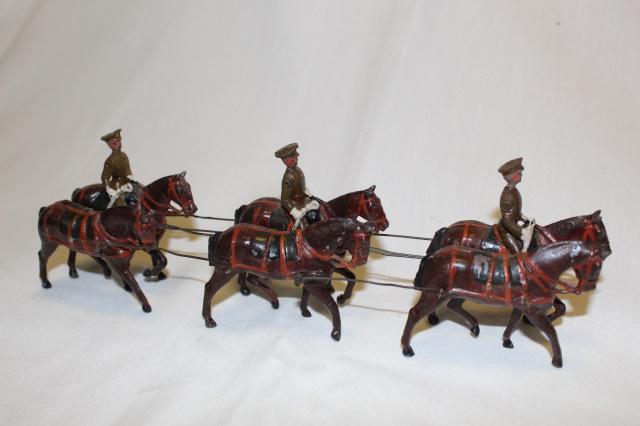 From Britains set #1440 Royal Artillery, walk: Pre-war, 6-horse walking team in khaki w peak caps. 54 mm. VG/E. No box.