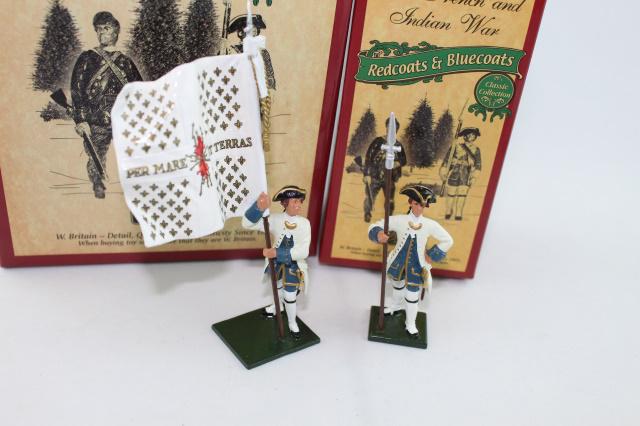 Britains #s 47040, 47042 Ensign & Officer: 2 pcs. (2 single-pc sets) 54 mm, French Compagnies Franches de la Marine Ensign with Colonel's Color, and Officer, 1754-1763 (Seven Years' War) MIB. Beautiful flag and uniforms.