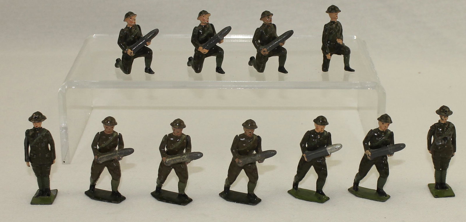 Britains From #1730 Gun Detachment: Lot includes Pre and Post War Figures. 11 Pieces. Condition Good. One Figure Damaged with Hole in Torso. No Box.